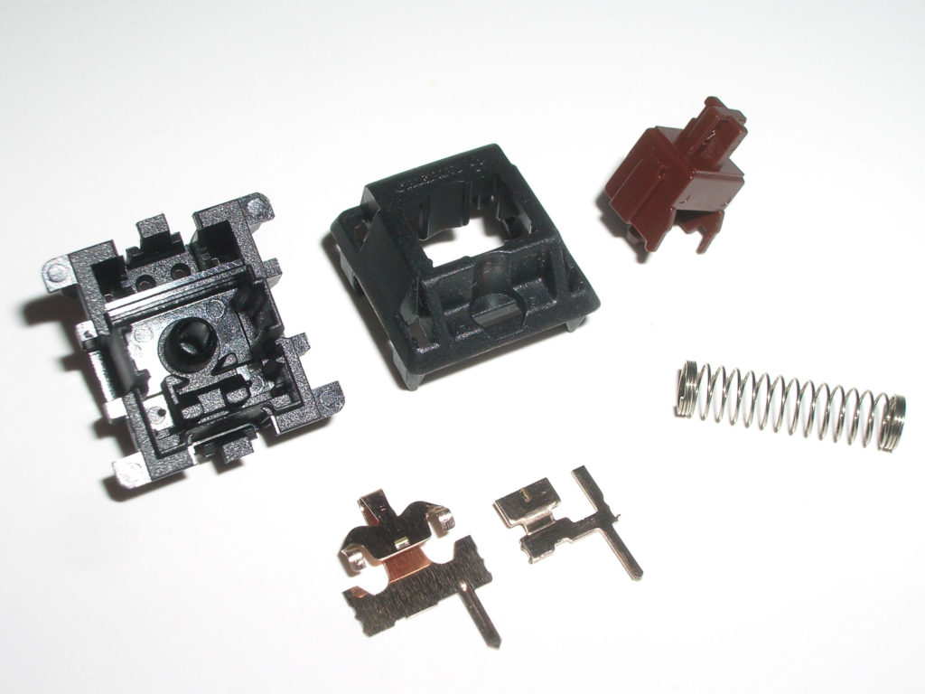 A disassembled Cherry MX Brown Switch