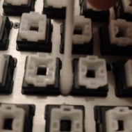 Use cotton swabs or foam swabs to clean smaller spaces between the switches. Small spaces